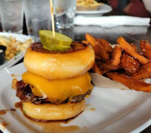 ypress Street Pint & Plate in Midtown Atlanta The donut (Krispy Kreme) burger - the perfect sweet & salty combo. pic by Amy Z. on Yelp